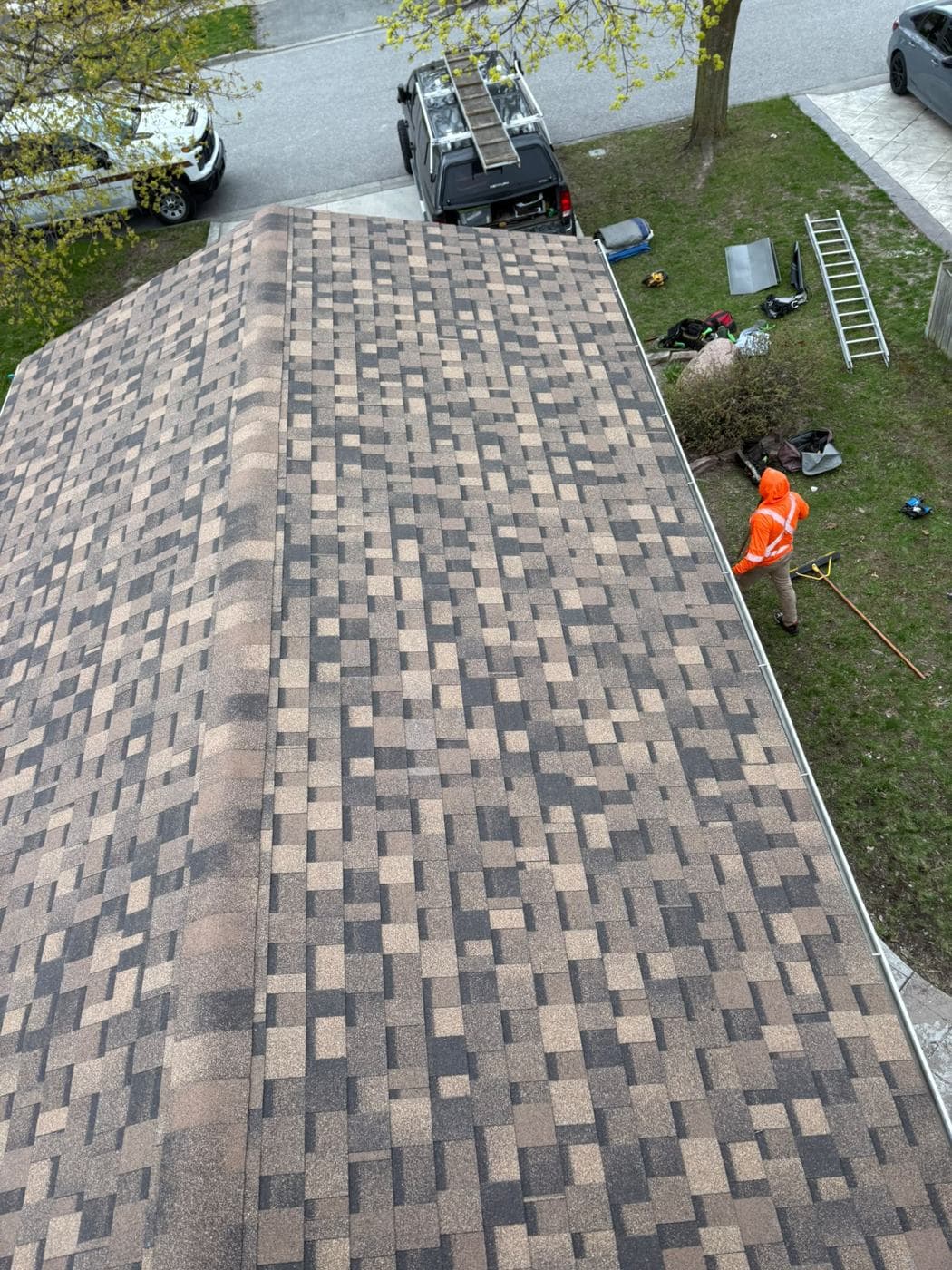Finished multi-tone laminate shingle roof, aerial view