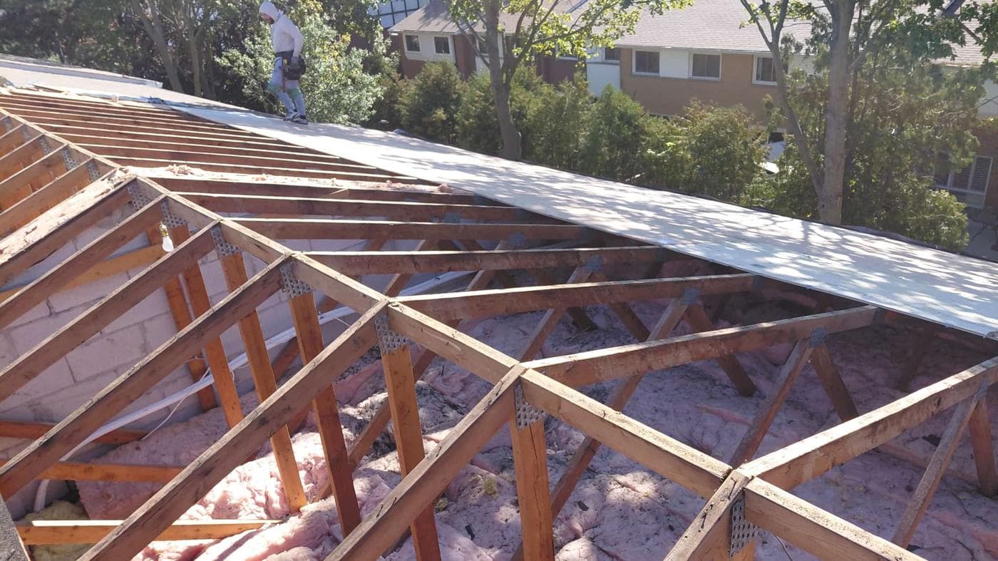 Roof deck replacement over attic insulation