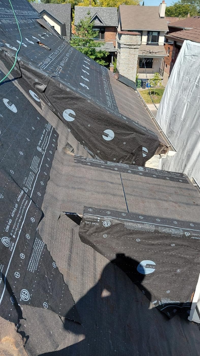 Synthetic underlayment installed around a chimney